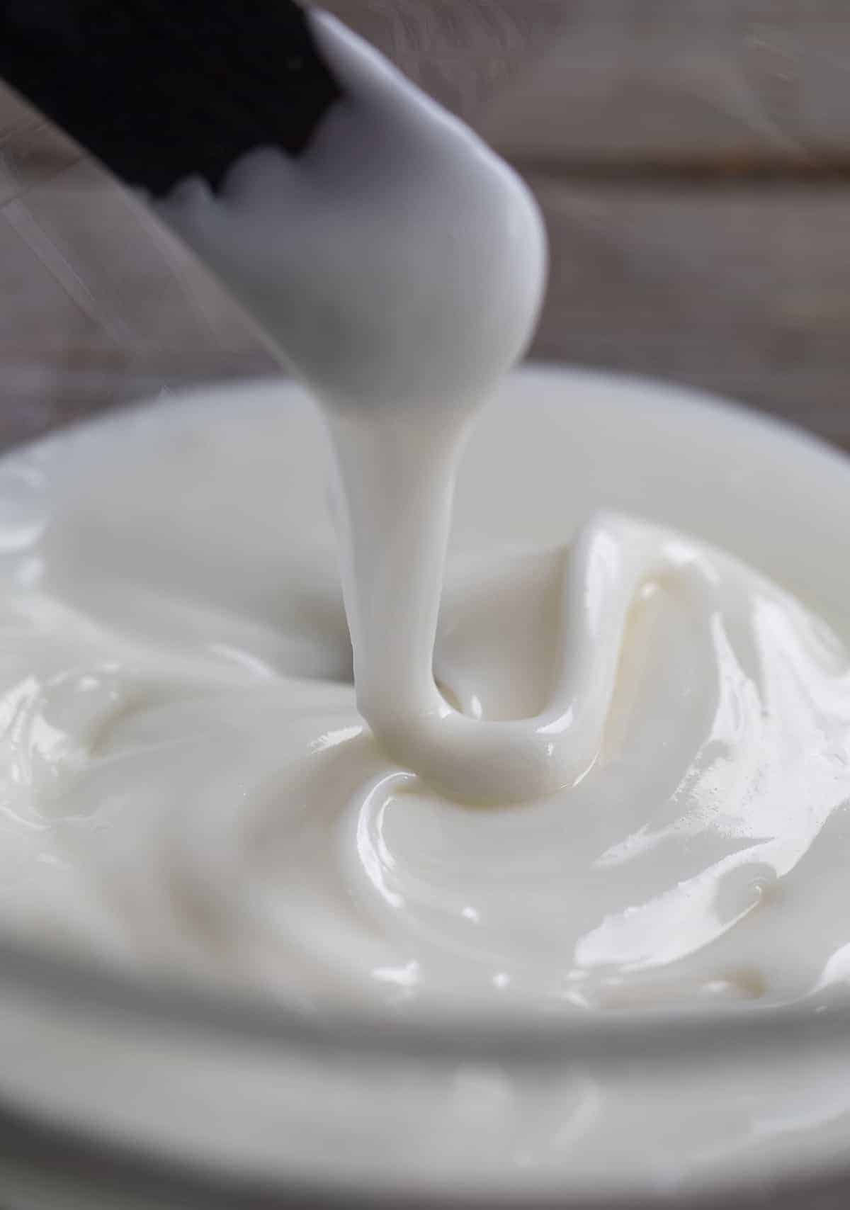 Sugar Cookie Icing Being Swirled with Offset Spatula