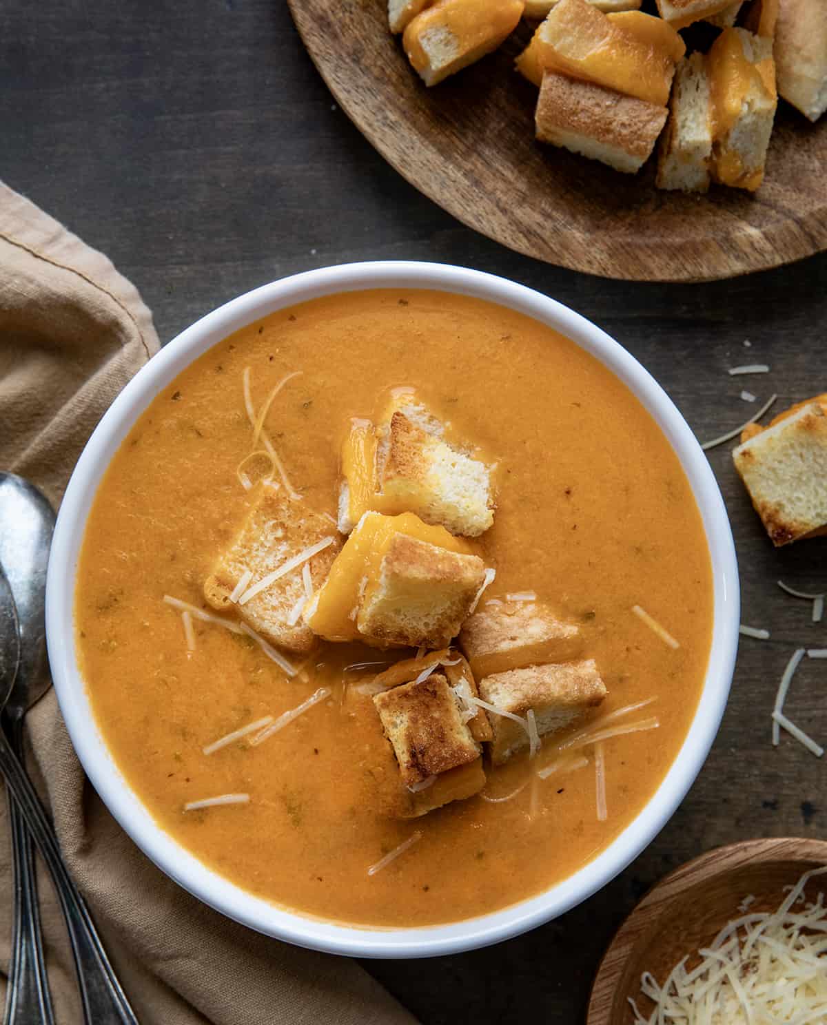Bowl of Tomato Soup with Grilled Cheese Croutons from Overhead. 