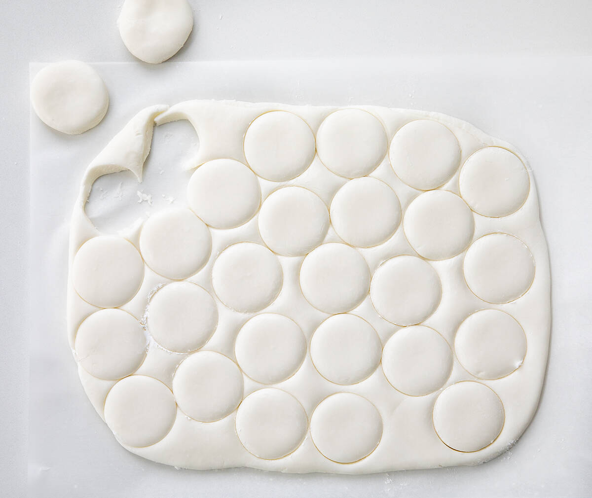 Image showing cut out circles for how to Make mint filling for Homemade Peppermint Patties.