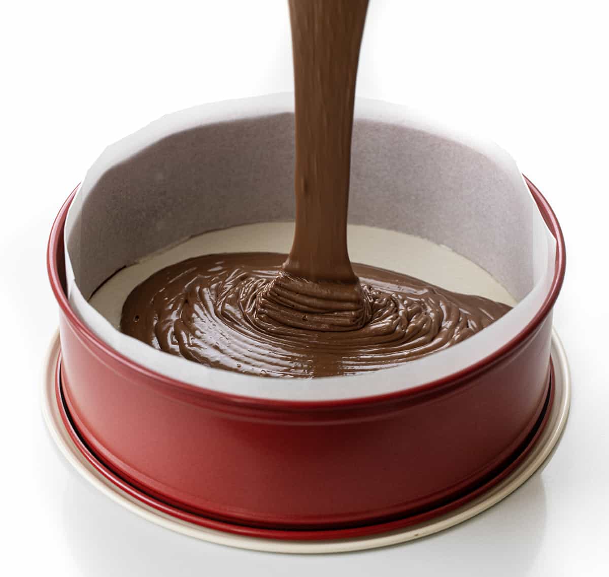 Pouring Batter into Springform Pan to Make Flourless Chocolate Cake.