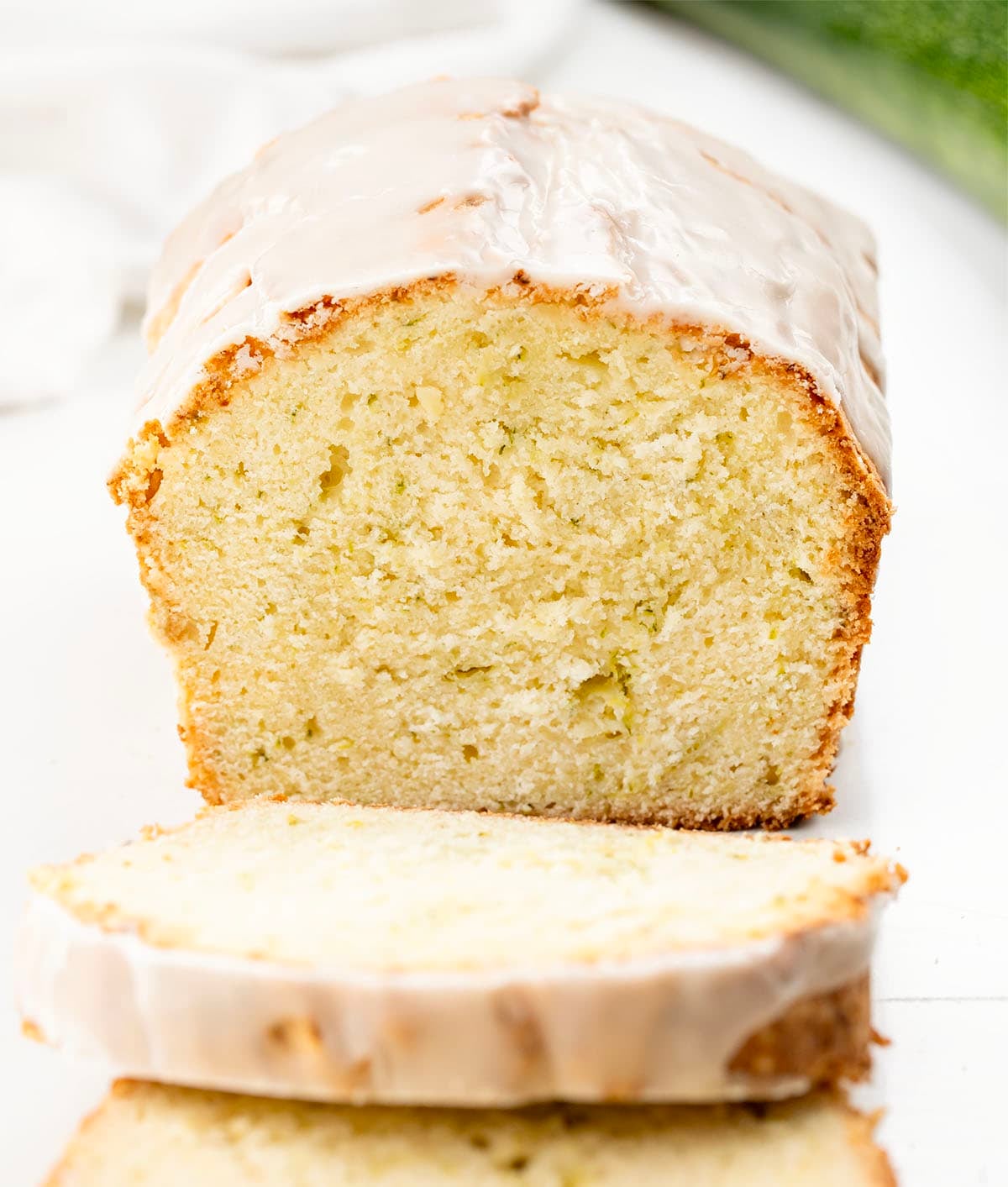 Cut into loaf of Zucchini Pound Cake showing tender texture inside.
