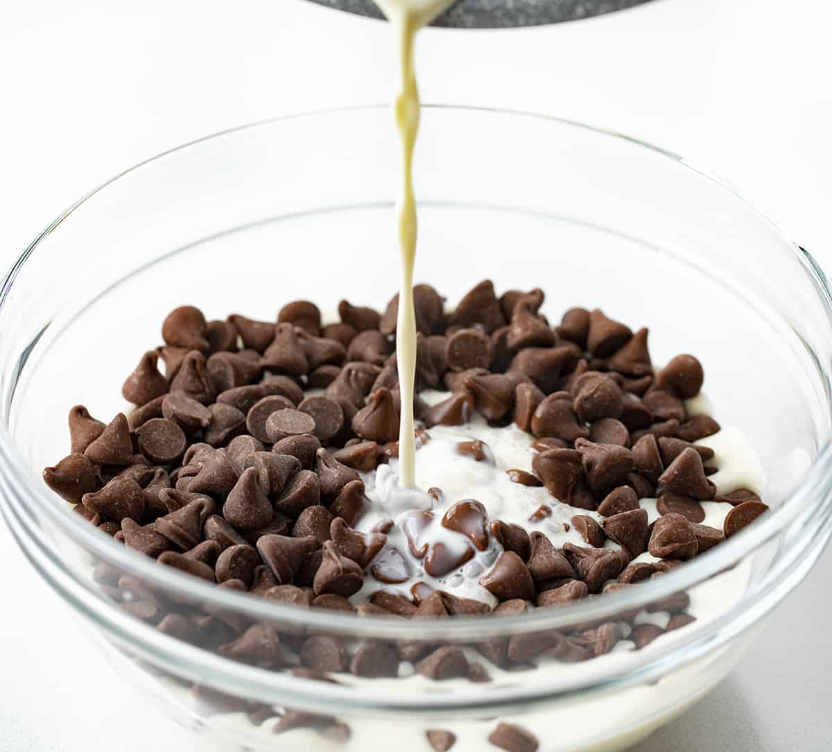 Pouring Hot Milk Over Chocolate Chips