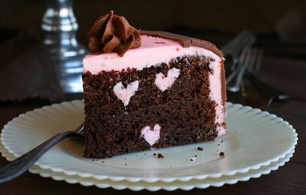 Chocolate Cake with Three Raspberry Buttercream Heart Carved Inside