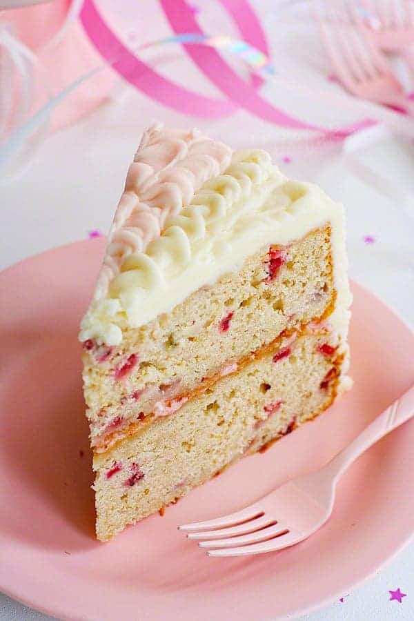 Homemade Strawberry Cake with Vertical Pink Ruffles by iambaker.net