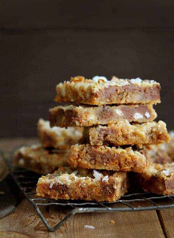 These Garbage Bars (also known as magic cookie bars) are a classic treat kicked up a notch! #magicbars #garbagebars #bars #iambaker #baking Magic Cookie Bars