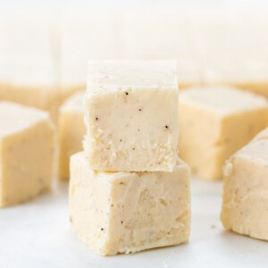 Stack of Browned Butter Fudge on a White Counter.