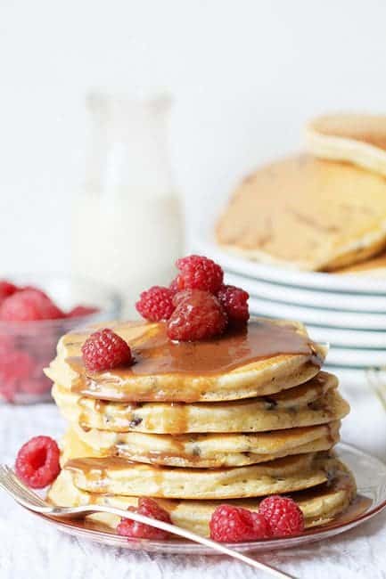 Chocolate Chip Pancakes with Chocolatey Butter Glaze and Raspberries! #breakfast #pancakes #chocolate #bestpancakes