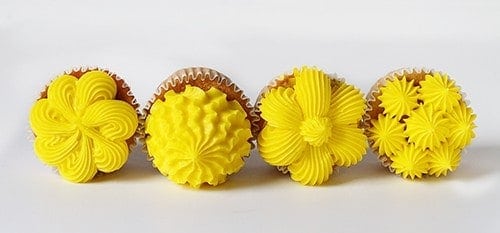 four cupcake decorating techniques using a large french star tip #cucpakes #cupcakedecorating #pipingtutorial