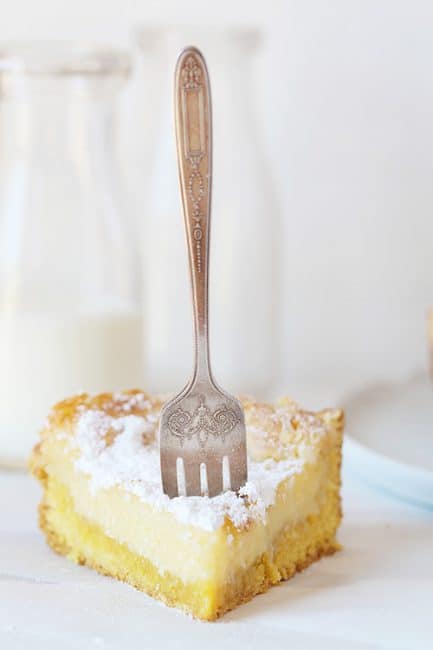 Fork in slice of gooey butter cake