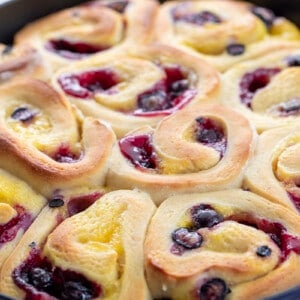 CLose up of Blueberry Lemon Skillet Rolls in a Pan Just out of the Oven.