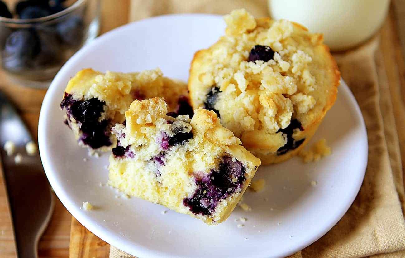 Broken Blueberry Pie Muffins on a White Plate