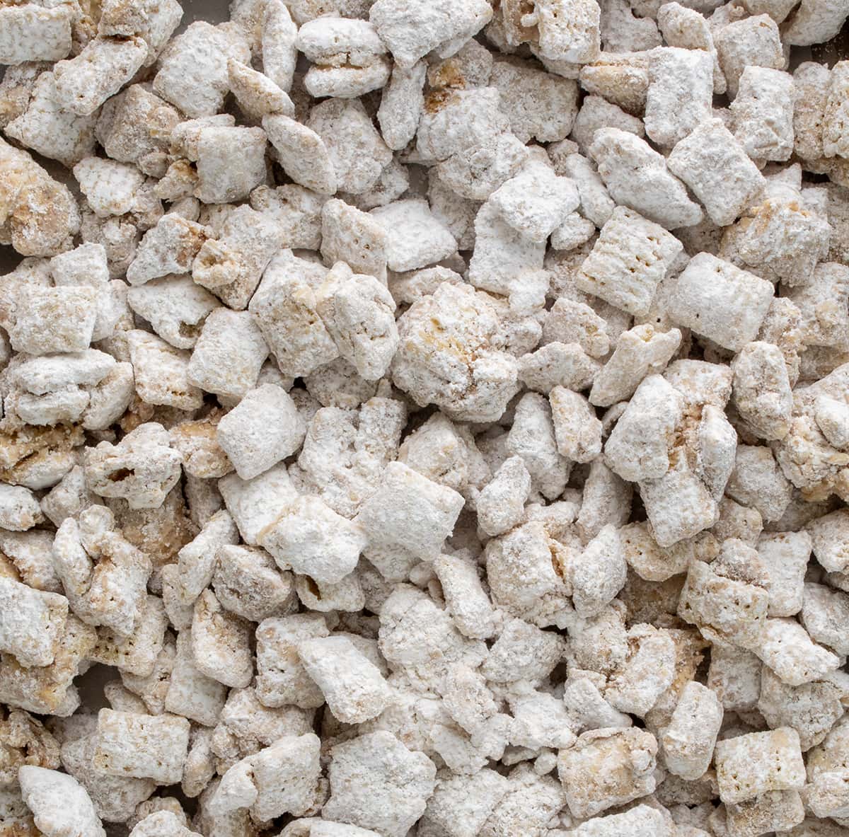 Close up of a tray of Pumpkin Spice Puppy Chow.