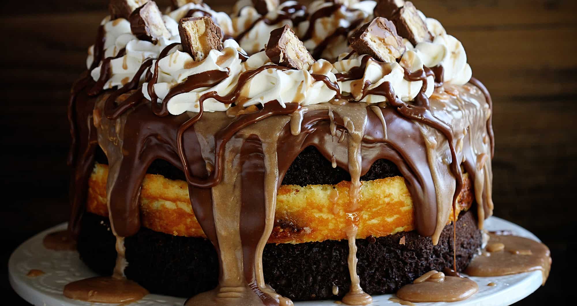 snickers cheesecake cake header