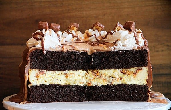 Snickers Cheesecake Cake - i am baker