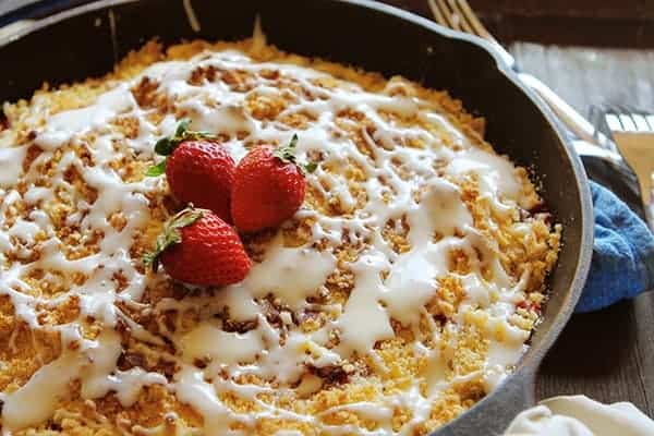 Skillet of Strawberry Crumble with Fresh Strawberries