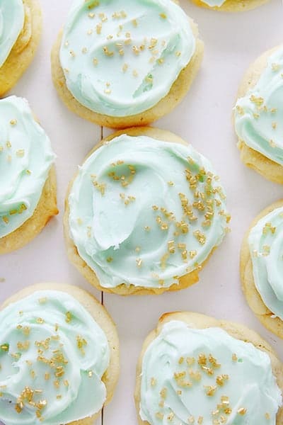 Sugar Cookies with Green Buttercream and Gold Sprinkles