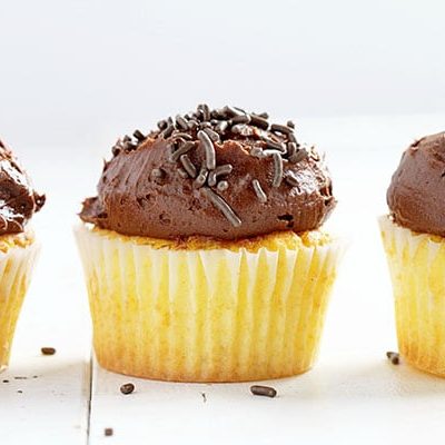 The Perfect Yellow Cupcake with a delicious Whipped Chocolate Buttercream! iambaker.net