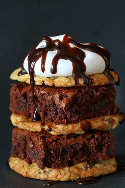 Crownie Sandwich~ Decadent Chocolate Brownie sandwiched between two Chocolate Chip Cookies and Covered in Hot Fudge Sauce