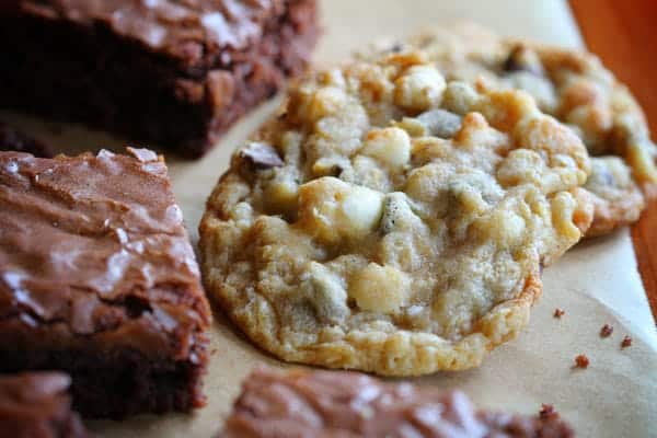 Crownie Sandwich~ Decadent Chocolate Brownie sandwiched between two Chocolate Chip Cookies and Covered in Hot Fudge Sauce