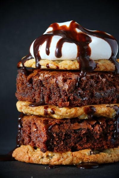 Crownie Sandwich~ Decadent Chocolate Brownie sandwiched between two Chocolate Chip Cookies and Covered in Hot Fudge Sauce