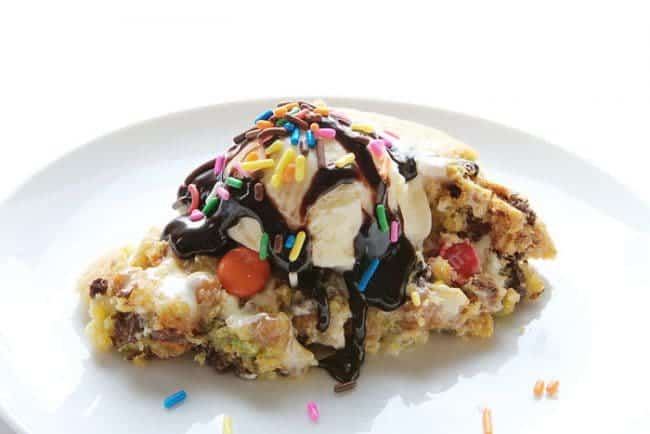 This decadent Skillet Cookie takes Ooey Gooey to a new level!