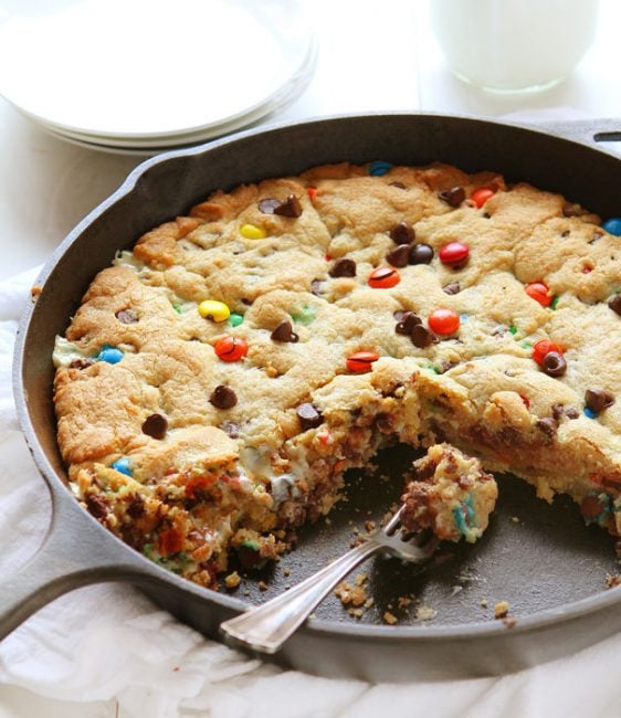 This decadent Skillet Cookie takes Ooey Gooey to a new level!