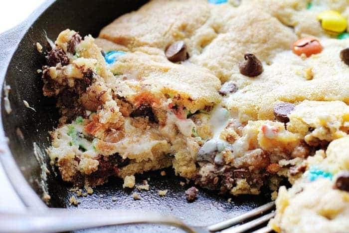 This decadent Skillet Cookie takes Ooey Gooey to a new level!