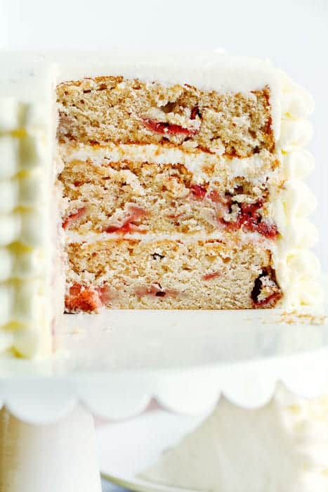 Seriously amazing From-Scratch Strawberry Cake with a silky Cream Cheese frosting that will blow your mind! Strawberry Cake, Real Strawberry Cake, No food color strawberry cake, cream cheese frosting, how to make strawberry cake, how to make cream cheese frosting, best cream cheese frosting, baking, cakes, recipes, i am baker, iambaker Inside slice of REAL strawberry Cake