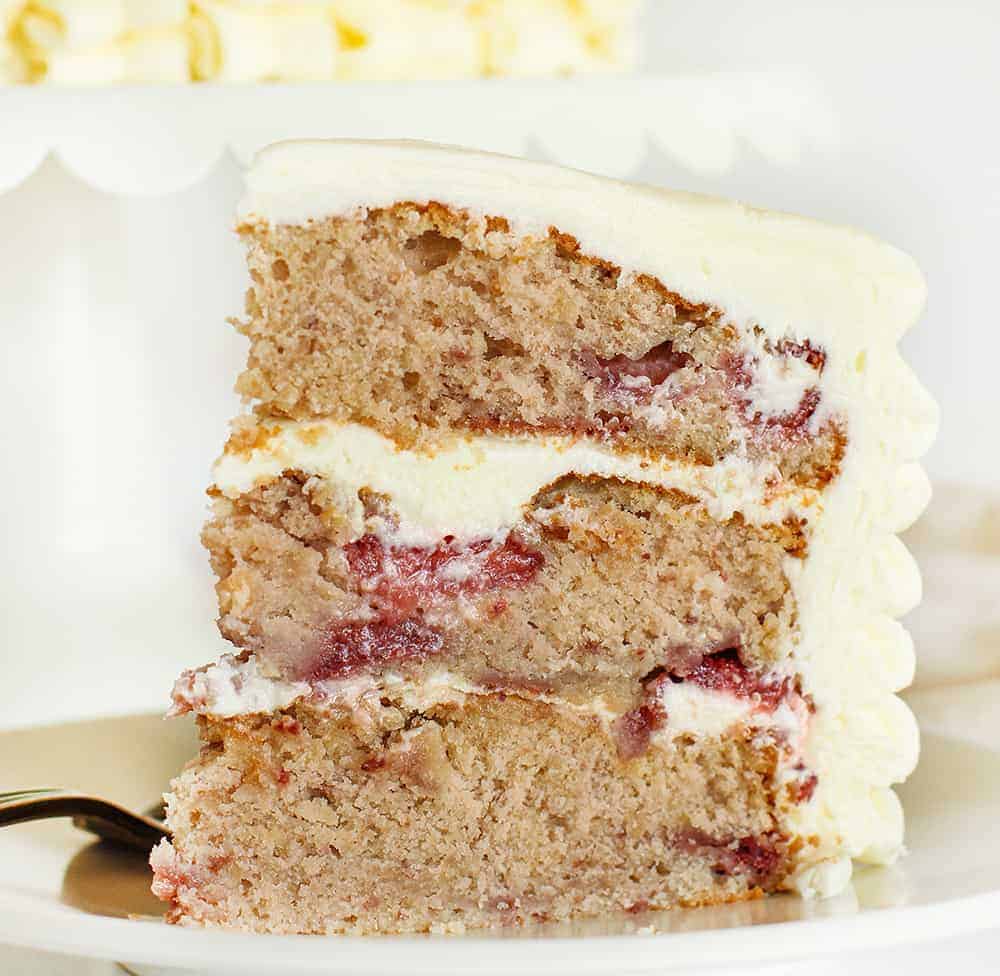 Slice of Strawberry Cake with Cream Cheese Frosting