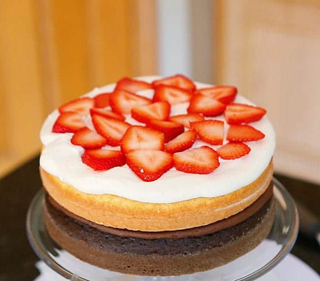 How to add strawberries to a layer cake.