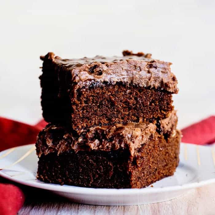 Two glorious pieces of chocolate cake with chocolate frosting!