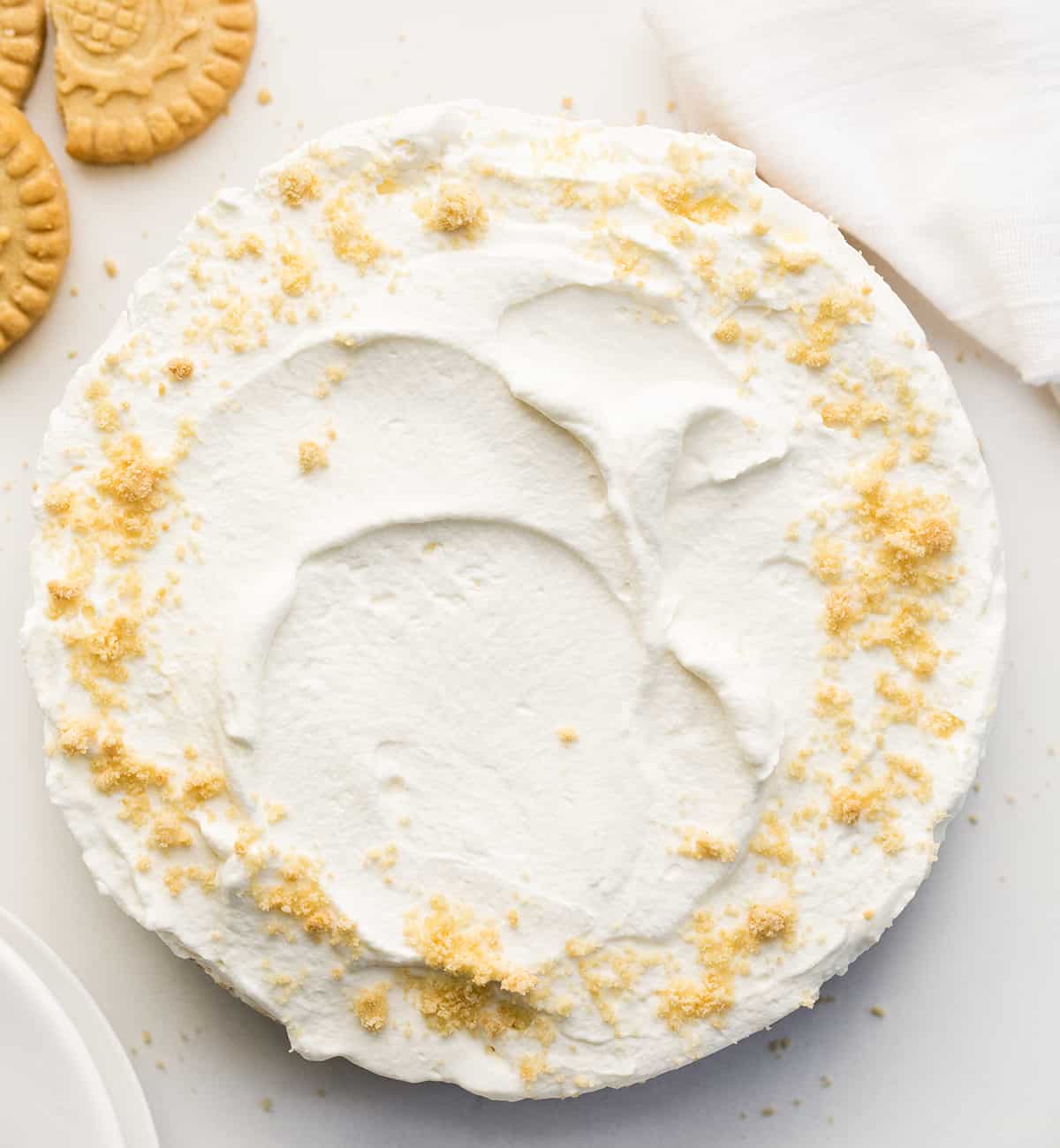 Banoffee Pie from Overhead showing the Completed Pie with Some Shortbread Crumbs Around the Edge.