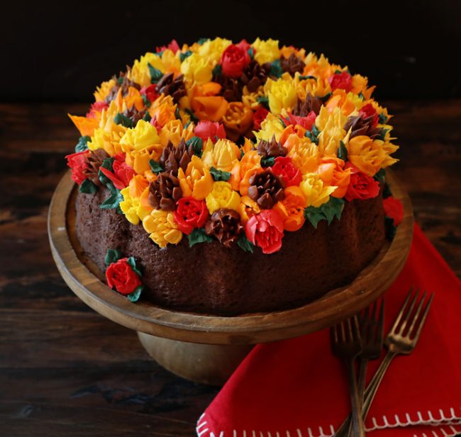 decorating a bundt cake with flowers