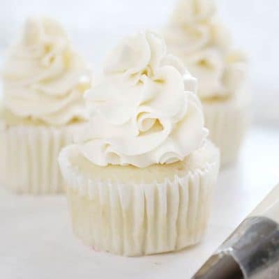 This easy version of Swiss Meringue is kicked up a notch with coconut!!