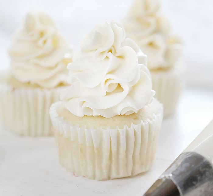 This easy version of Swiss Meringue is kicked up a notch with coconut!!