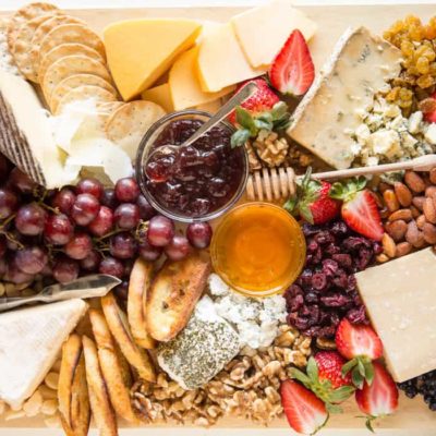 Learn how to build your own delicious Cheese Tray! Pair a variety of cheeses with fruits, nuts, crackers, and spreads for the ultimate appetizer platter.