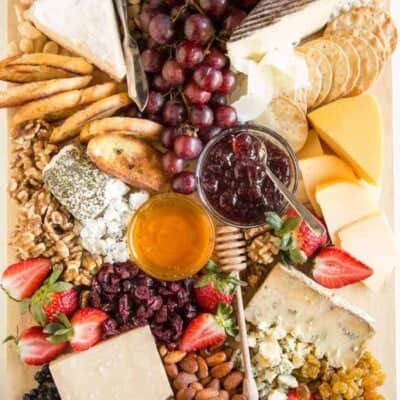 Learn how to build your own delicious Cheese Tray! Pair a variety of cheeses with fruits, nuts, crackers, and spreads for the ultimate appetizer platter.