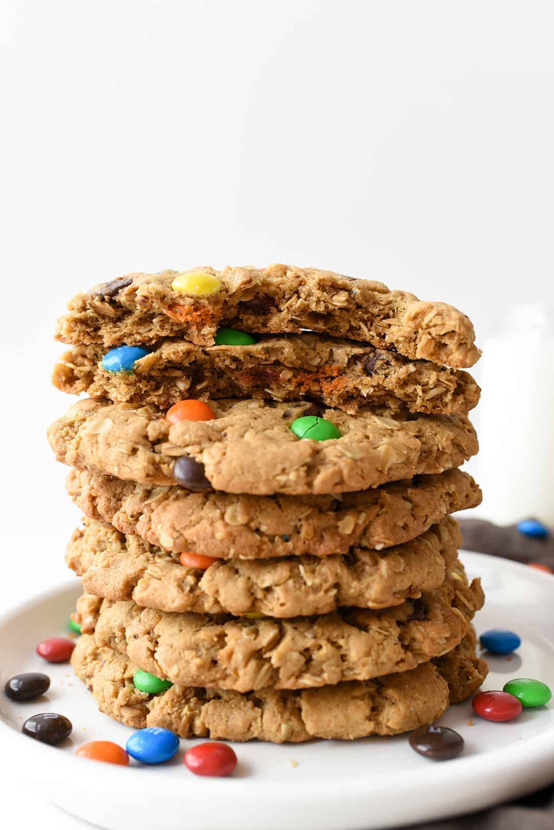 Monster Cookie Recipe Stacked and Top Cookie Broken in Half