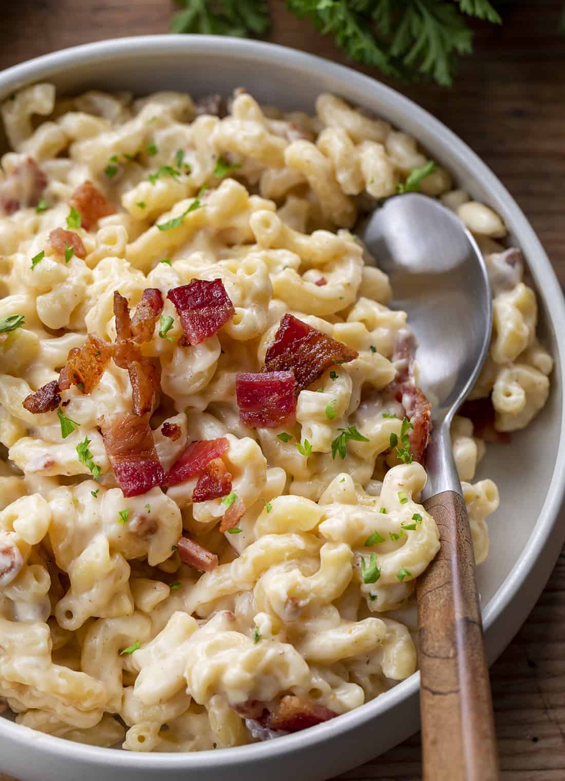 Bowl of Bacon Macaroni and Cheese with Spoon
