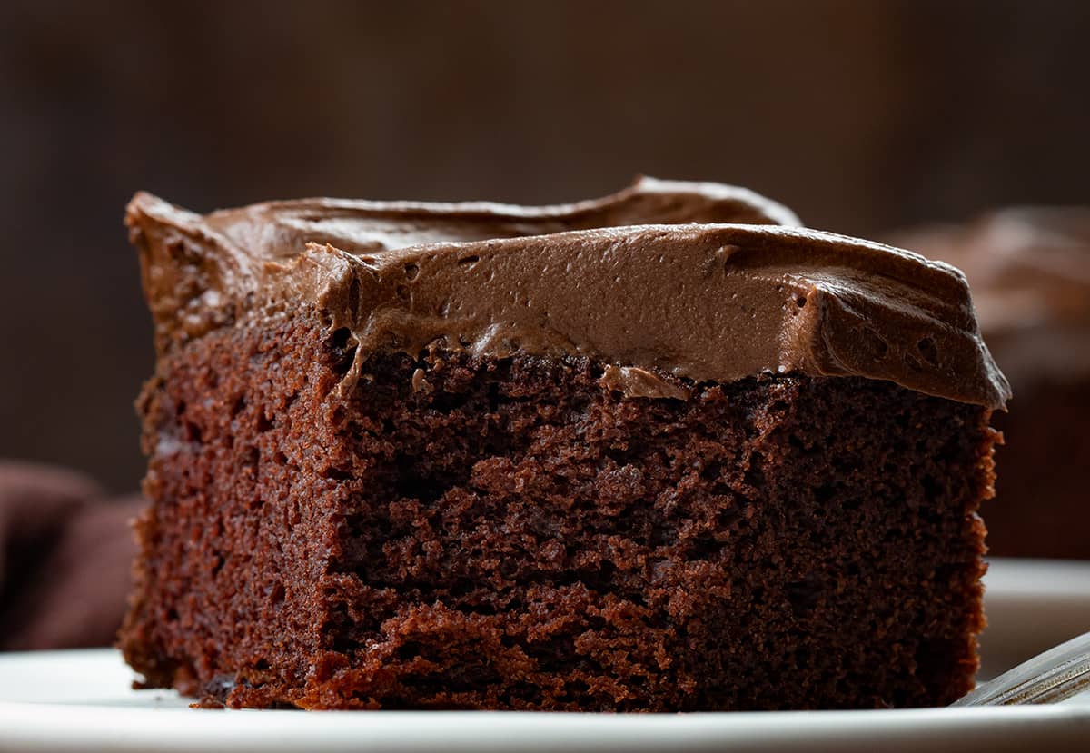 Close up of Chocolate Mayo Cake with a Corner Section Removed.
