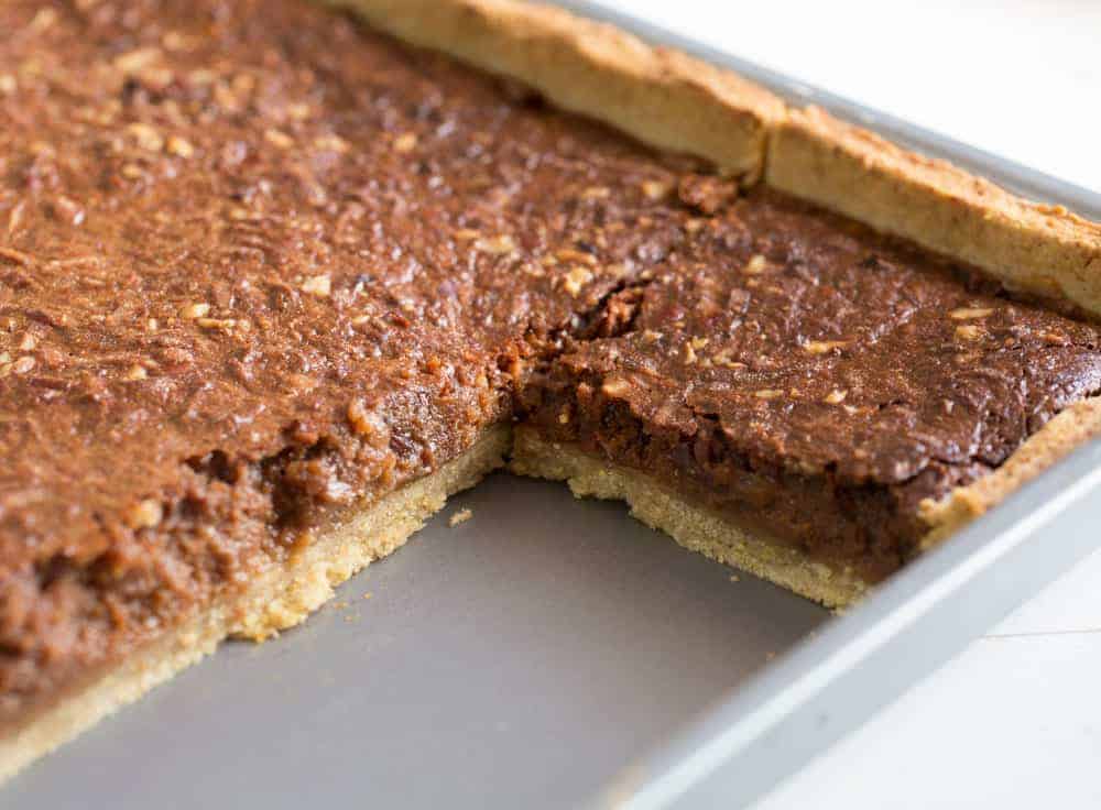 Sheet Pan with Pieces of German Chocolate Slab Pie Taken Out
