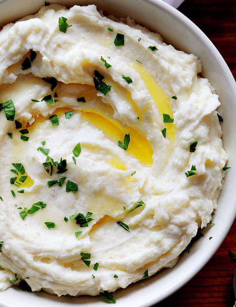 Bowl of Mashed Potatoes with butter