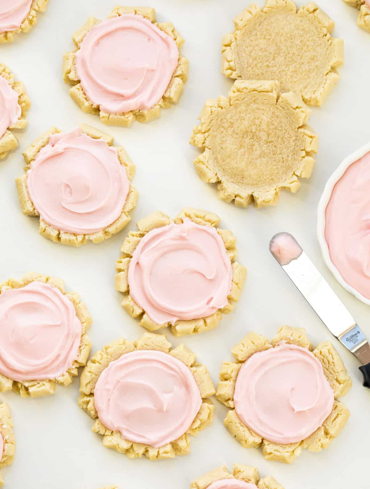 Frosted Sugar Cookies from Overhead with a Few Cookies not Frosted. Dessert, Cookies, Cookie Recipes, Swig Copycat, Baking, Cookie Exchange, Frosted Cookies, iambaker cookie recipes, the best sugar cookies, sugar cookie, i am baker, iambaker