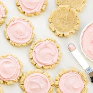 Frosted Sugar Cookies from Overhead with a Few Cookies not Frosted. Dessert, Cookies, Cookie Recipes, Swig Copycat, Baking, Cookie Exchange, Frosted Cookies, iambaker cookie recipes, the best sugar cookies, sugar cookie, i am baker, iambaker