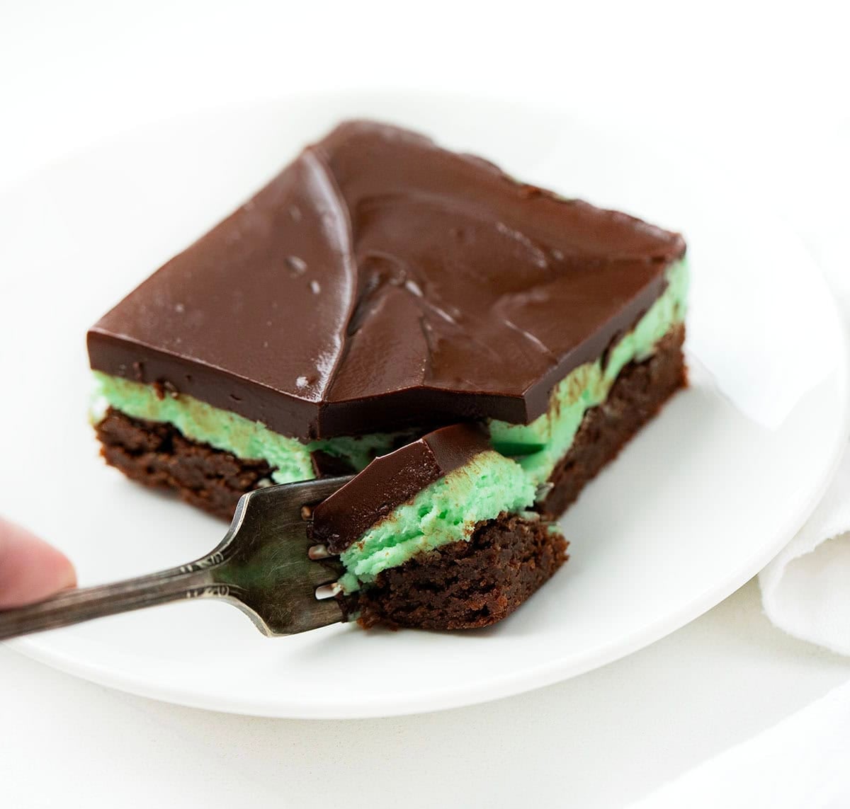 Taking a bite from a Fudgy Chocolate Mint Brownie.