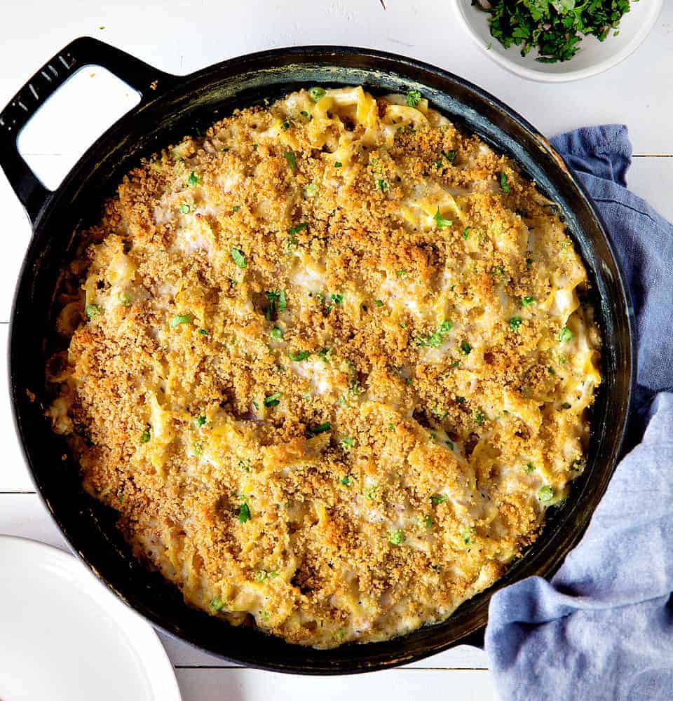 Tuna Casserole Shot Overhead in a Skillet with Blue Towel