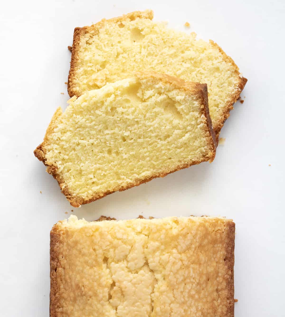 Slices of Loaf Pound Cake From Overhead. Dessert, Cake, Pound Cake, Vanilla Pound Cake, Loaf Cake, Loaf Pound Cake, Vanilla Cake, Old Fashioned Cake Recipes, Original Vanilla Pound Cake, No Vanilla Extract Cake, recipes, iambaker, i am baker