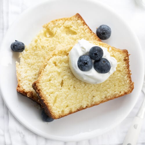 Two Pieces of Vanilla Pound Cake on a Plate. Dessert, Cake, Pound Cake, Vanilla Pound Cake, Loaf Cake, Loaf Pound Cake, Vanilla Cake, Old Fashioned Cake Recipes, Original Vanilla Pound Cake, No Vanilla Extract Cake, recipes, iambaker, i am baker
