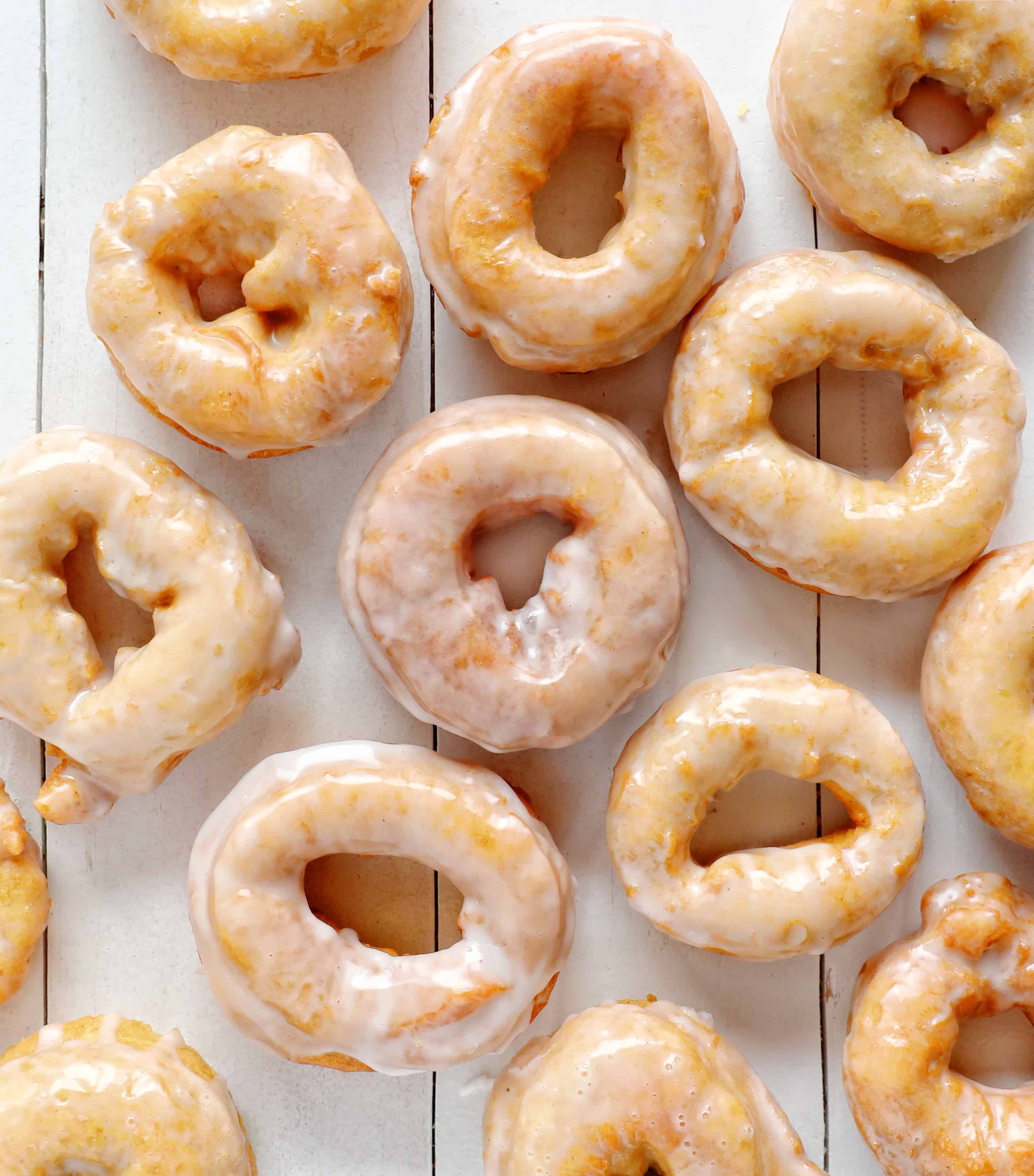 Glazed Cake Donuts from Overhead on White Board