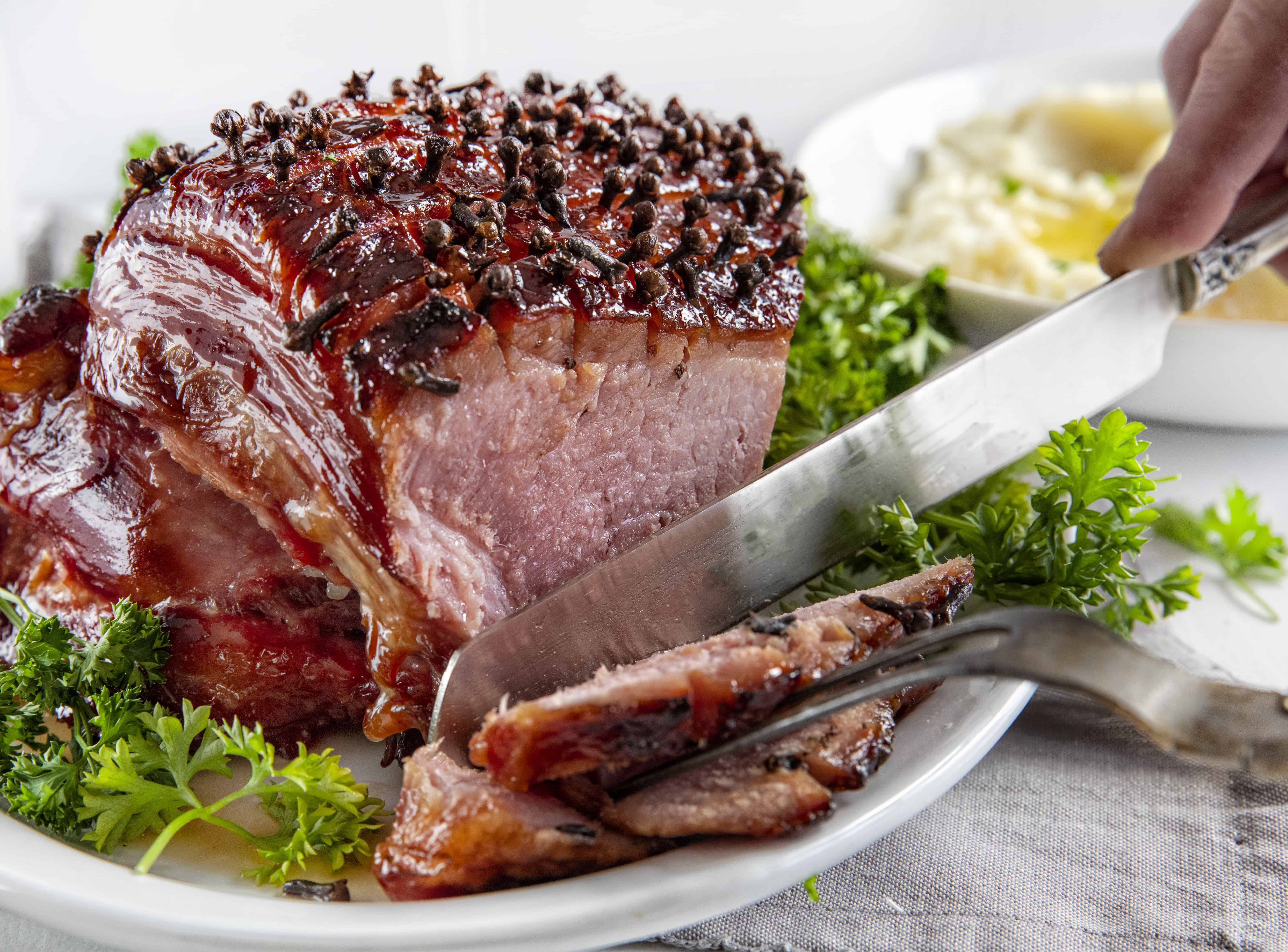 Cutting Into Honey Glazed Ham